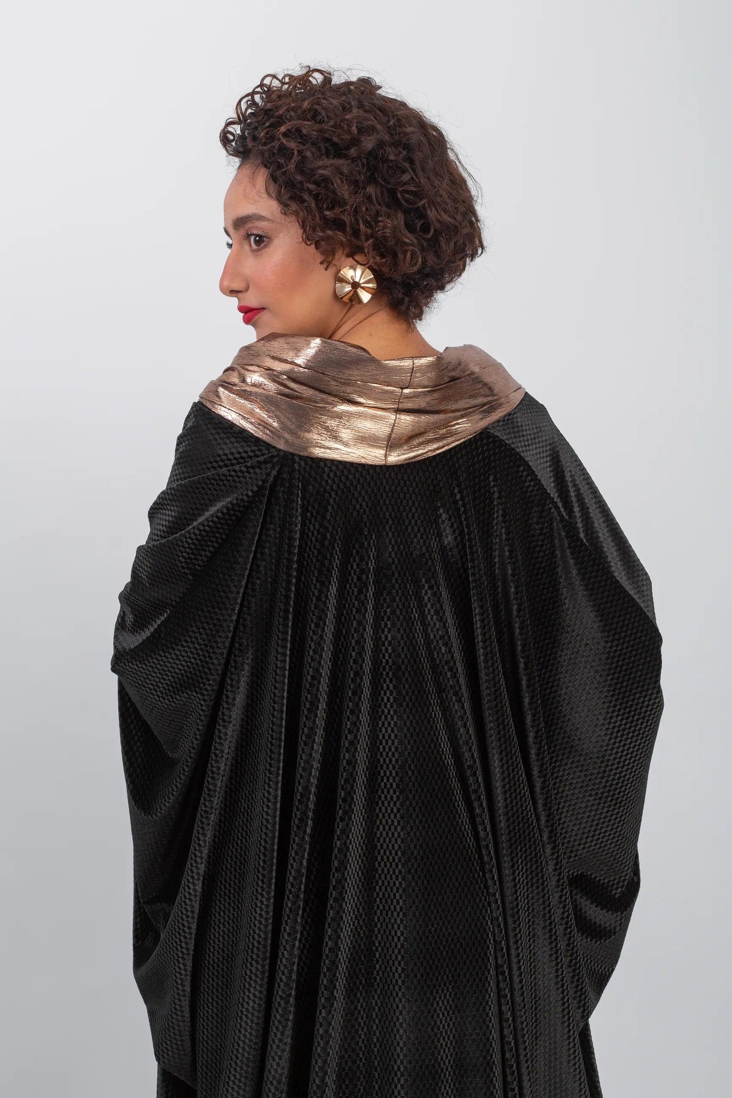 Elegant chic black kaftan with gold highlight - Bisht Couture