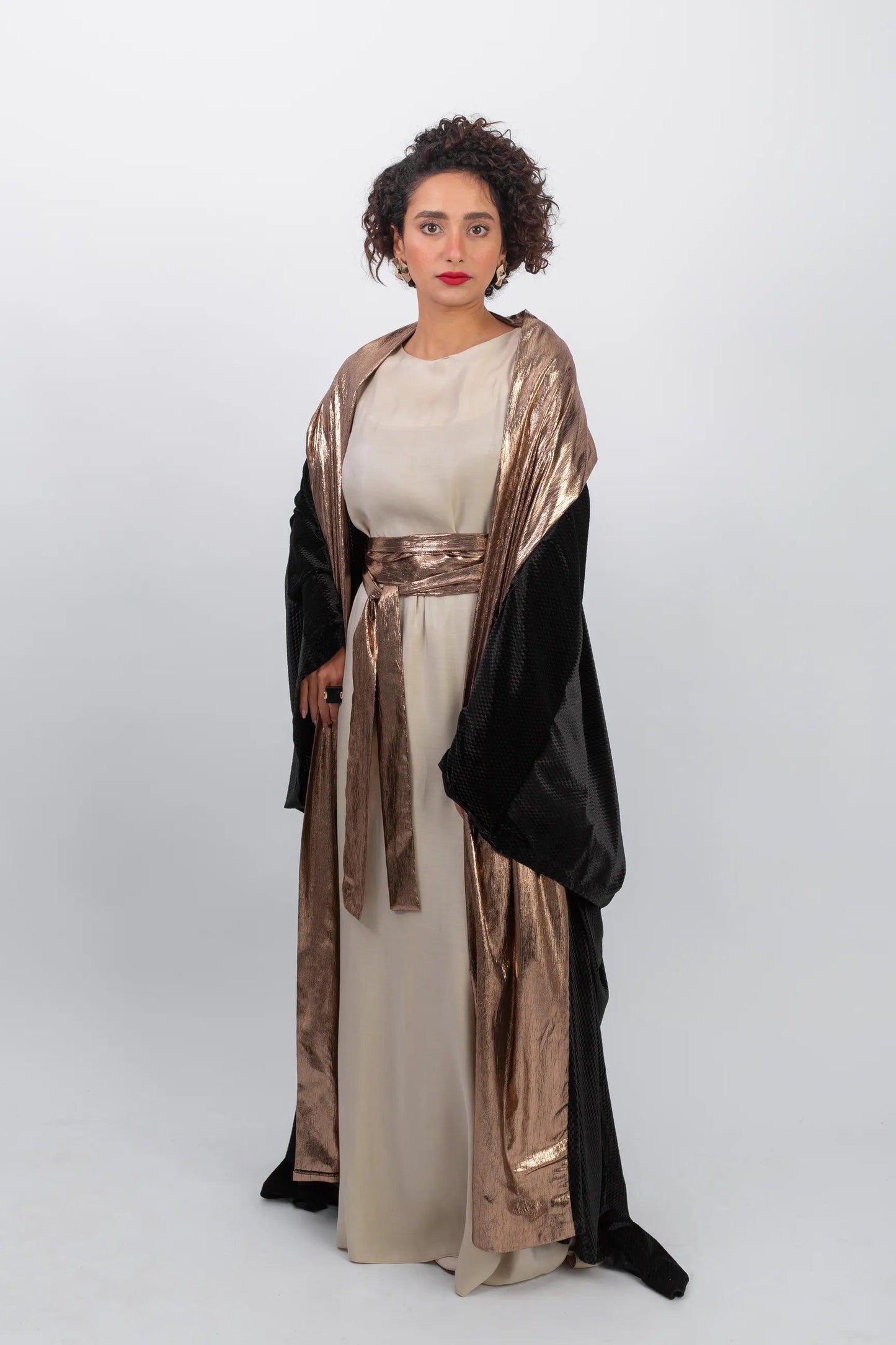 Elegant chic black kaftan with gold highlight - Bisht Couture