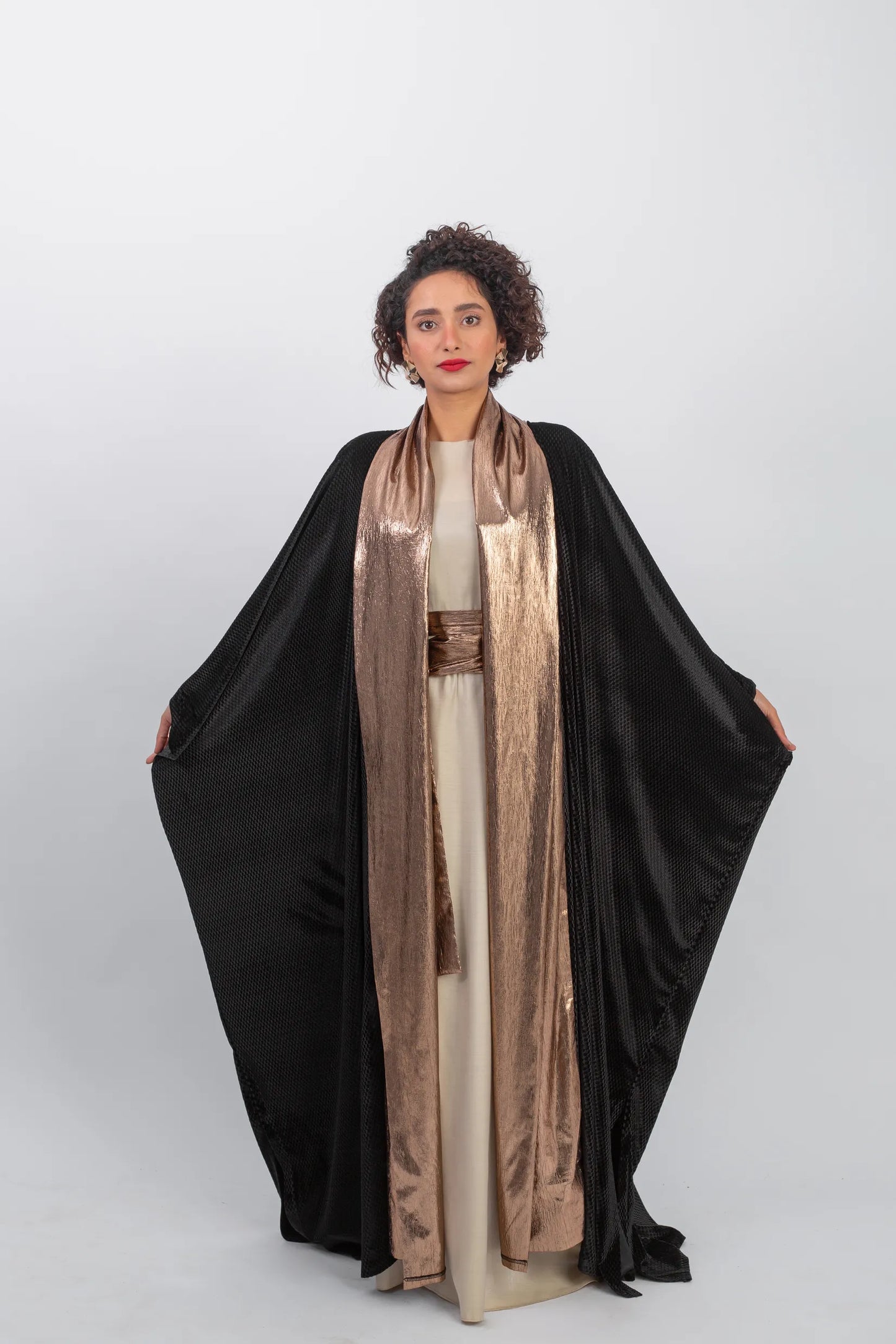 Elegant chic black kaftan with gold highlight