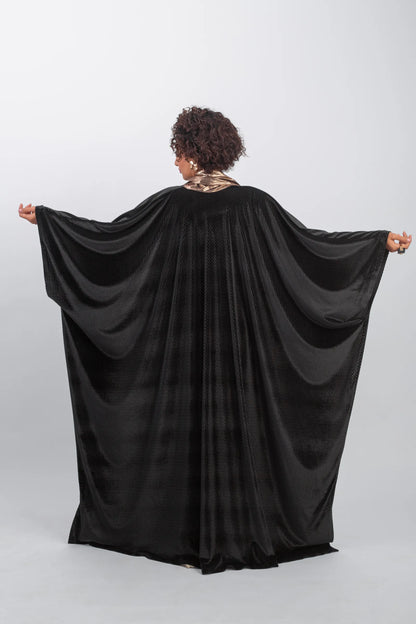 Elegant chic black kaftan with gold highlight